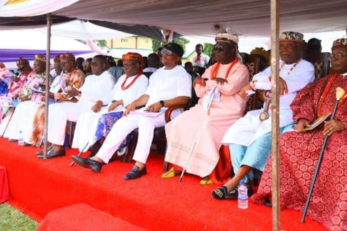 OBA at a gathering surrounded by distinguished guests